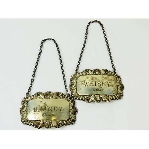 165 - Matched pair of Hallmarked Silver Decanter Collars with chains. Combined weight 26.8g  See photos.