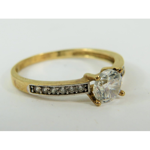 167 - 9ct Yellow gold CZ set ring.