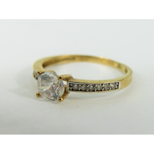 167 - 9ct Yellow gold CZ set ring.