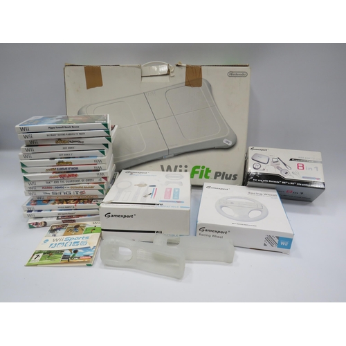 485 - Wii fit plus large selection of games and various accessories.