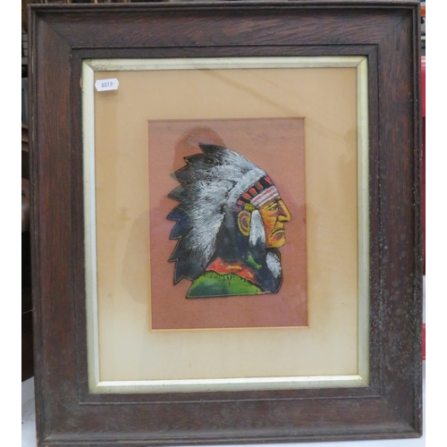 569 - Framed handpainted piece of leather of a Native American Indian, the frame measures 19