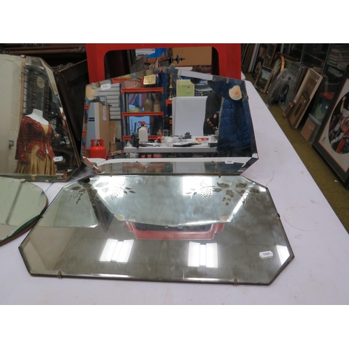 579 - 4 Vintage bevel edge mirrors the largest is 56cm by 33cm.