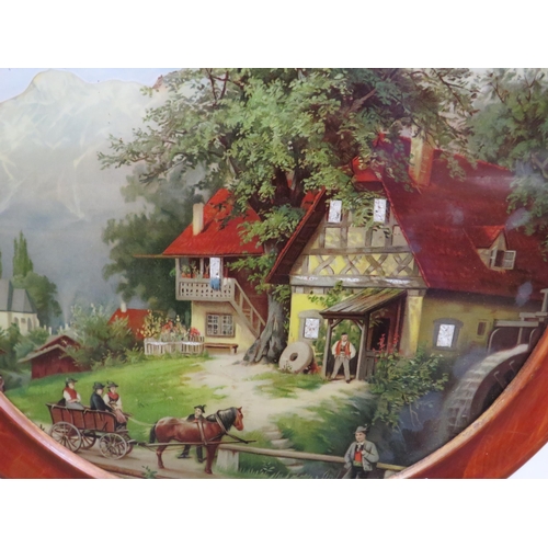 595 - Circular framed decorative glass picture of a austrian scene.