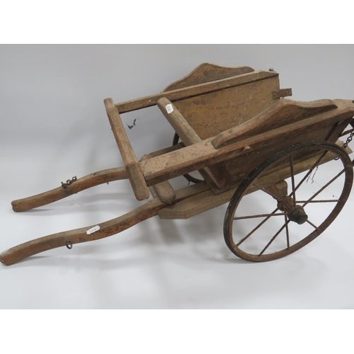 619 - Vintage hand made model of a horsedrawn cart with Iron wheels. Measures approx 28 inches Long x 15 I... 