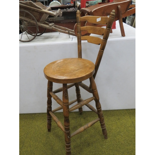 622 - Oak made bar stool with integrated back rest. Seat Height 27 inches.  Back height 39 inches. See pho... 