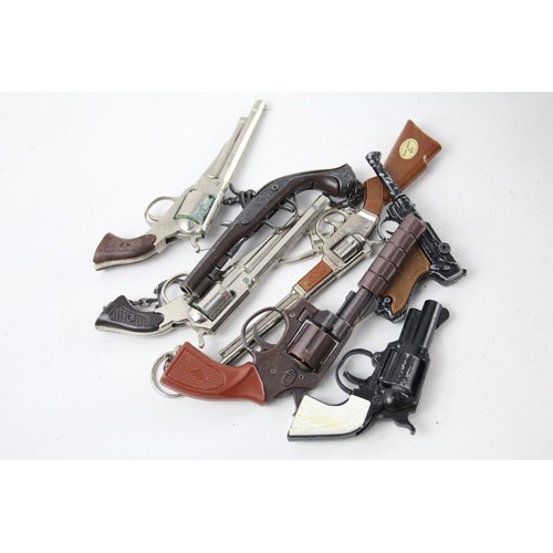 363 - Collection of Gun Key rings     484810