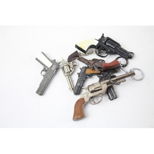 363 - Collection of Gun Key rings     484810