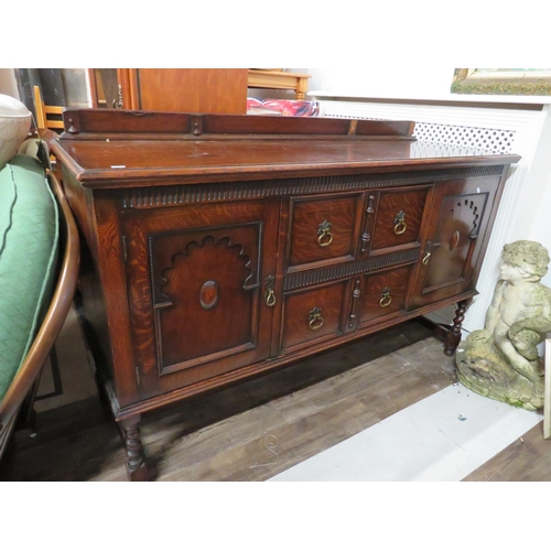 642 - Early 20th Century Oak Dresser with carved decoration to front. Two cupboard doors.. H:36 x W:59 x D... 