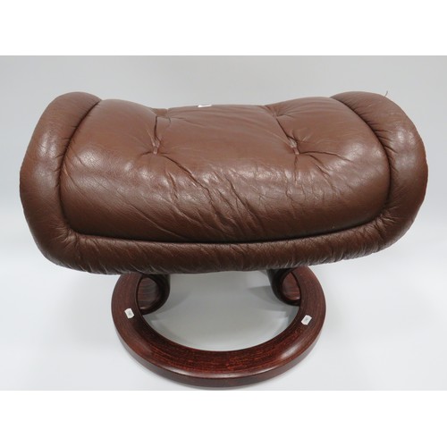 628 - Ekornes Norwegian made leather topped footstool with circular hardwood frame   See photos.