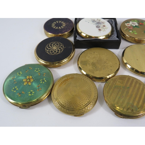 174 - 10 Gold tone compacts by Stratton, Kigu etc.