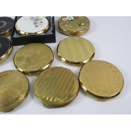 174 - 10 Gold tone compacts by Stratton, Kigu etc.