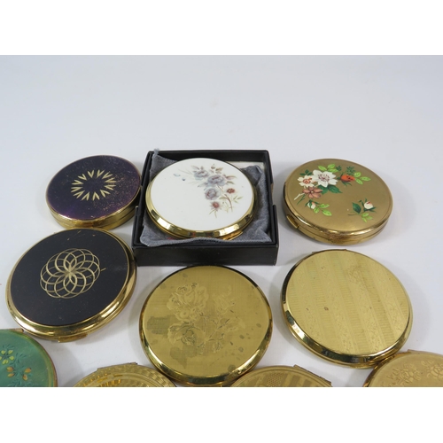 174 - 10 Gold tone compacts by Stratton, Kigu etc.