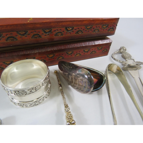 177 - Wooden box and contents including a pair of art nouveau pincers, napkin rings etc.