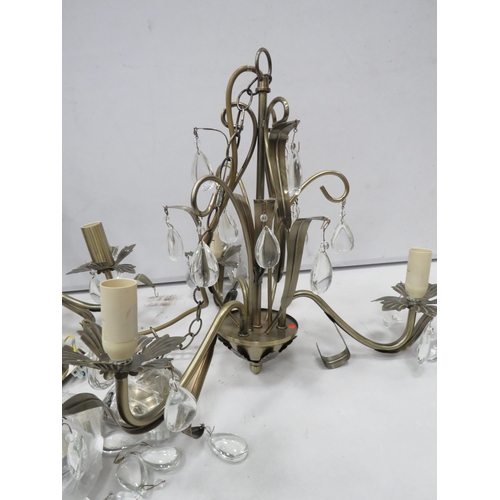 835 - Two modern 3 arm bronze effect chandeliers.