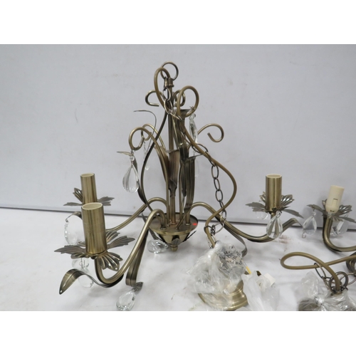 835 - Two modern 3 arm bronze effect chandeliers.