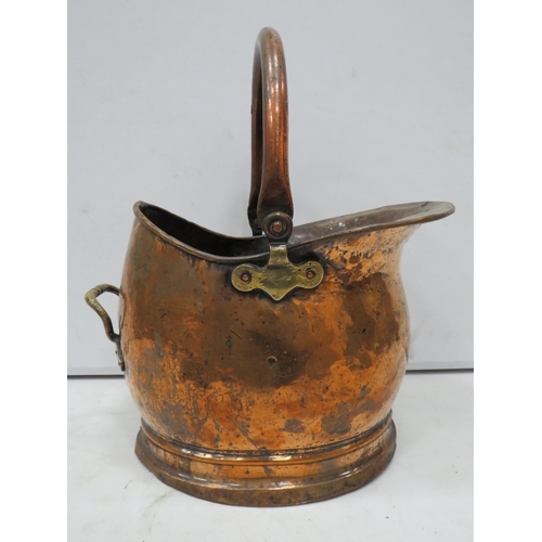 837 - Vintage hammered copper helmet shape coal bucket.