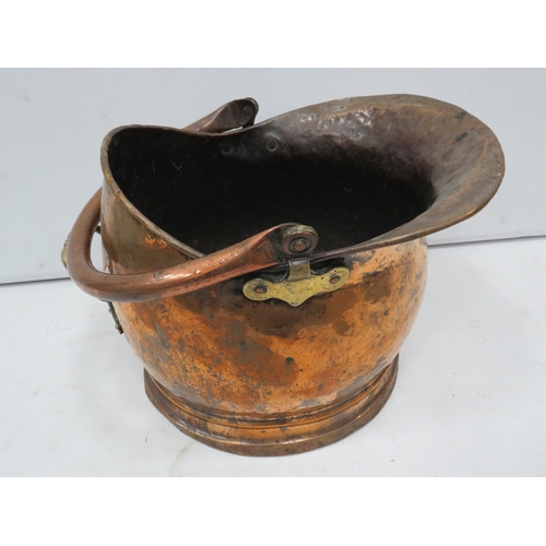 837 - Vintage hammered copper helmet shape coal bucket.