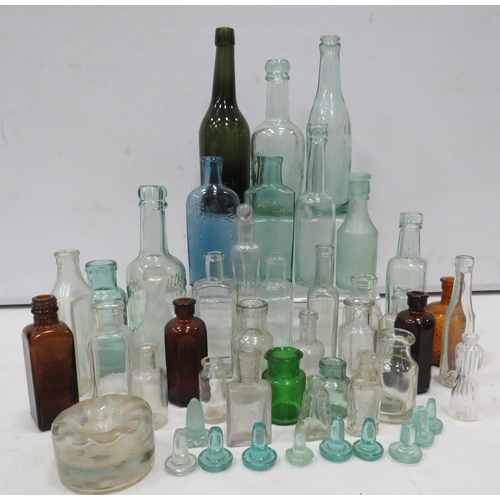 852 - Selection of vintage glass bottles including Advertising and Medical.