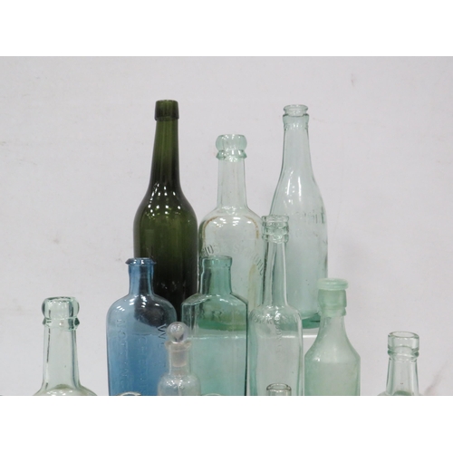 852 - Selection of vintage glass bottles including Advertising and Medical.