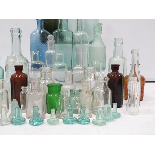 852 - Selection of vintage glass bottles including Advertising and Medical.