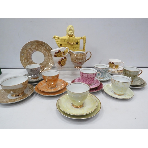 854 - Vintage Lingard yellow Humpty Dumpty teapot and a selection of lustre cups and saucers etc.