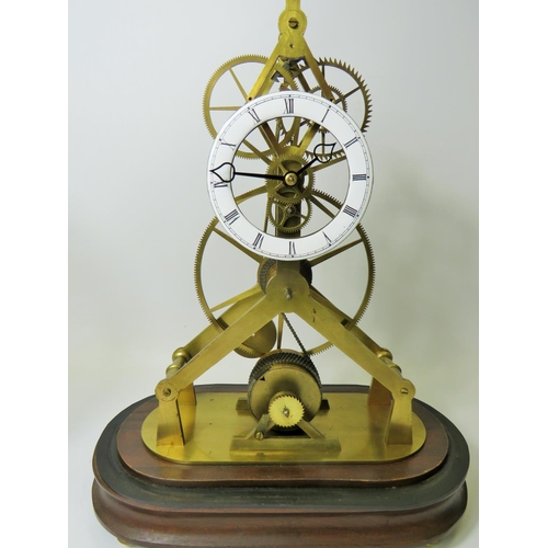 35 - Brass Skeleton Clock with enamelled metal dial. Appears to be complete and in running order.  No Mak... 