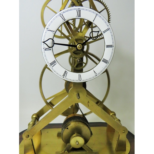 35 - Brass Skeleton Clock with enamelled metal dial. Appears to be complete and in running order.  No Mak... 