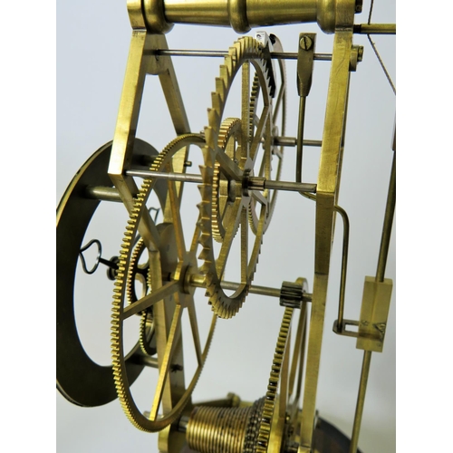 35 - Brass Skeleton Clock with enamelled metal dial. Appears to be complete and in running order.  No Mak... 