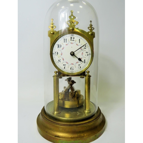 38 - Brass based Anniversary clock under Glass Dome.  Appears to be in running order but no key present. ... 