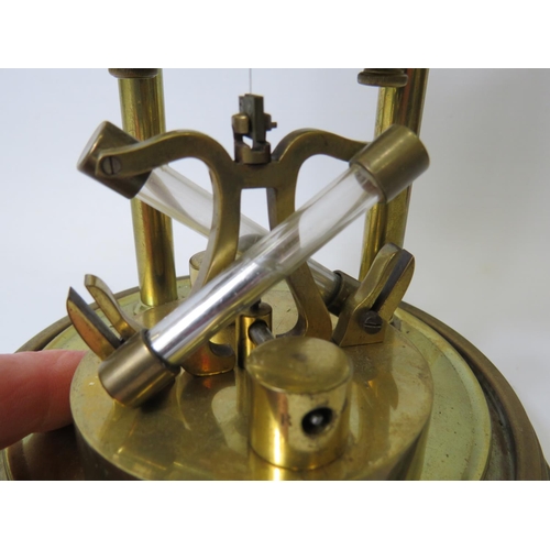 38 - Brass based Anniversary clock under Glass Dome.  Appears to be in running order but no key present. ... 