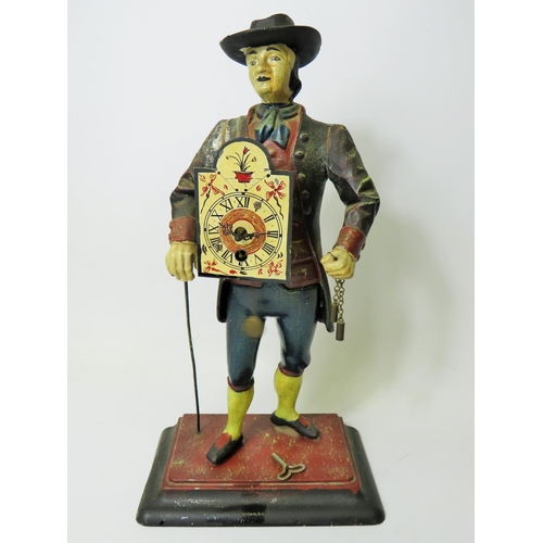 42 - Early 20th Century Cast Iron figural novelty Clock as a Clock Peddler. Painted cast Iron body in goo... 