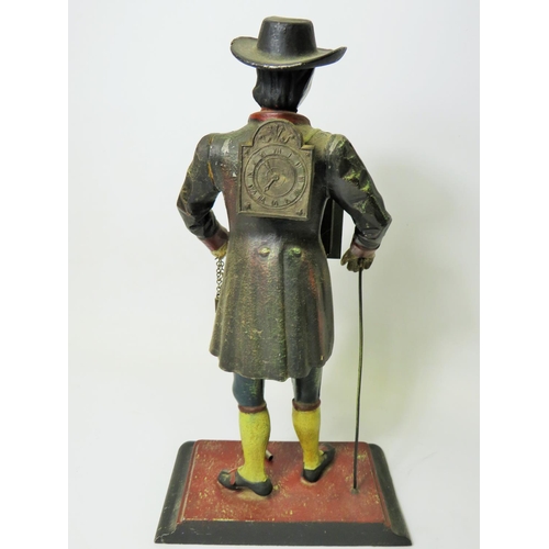 42 - Early 20th Century Cast Iron figural novelty Clock as a Clock Peddler. Painted cast Iron body in goo... 