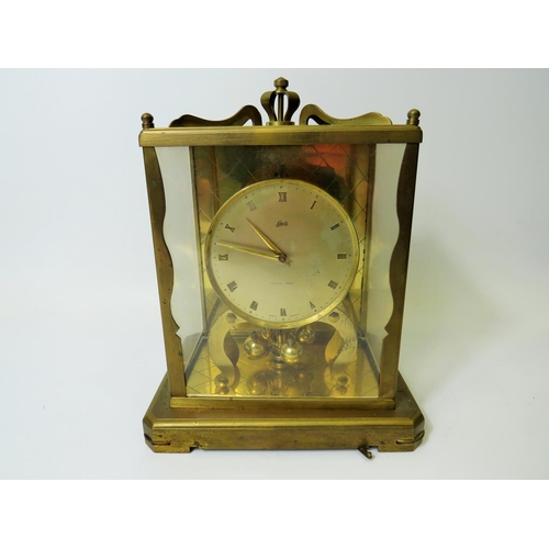 44 - Schatz 1000 day Anniversary clock. Geman made. Comes with Adjustable brass base. In running order bu... 