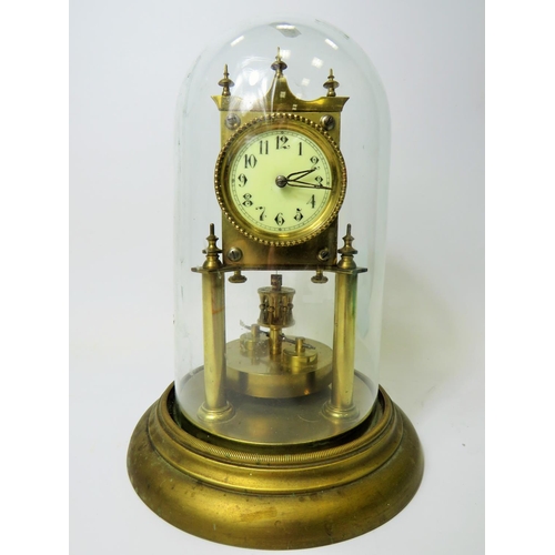 46 - Brass made Anniversary clock with enamel face. No makers mark .  Appears to be in running order. Gla... 