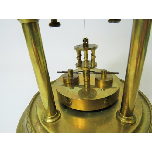 47 - German made brass Anniversary clock under Glass dome. Appears to be in running order.  Small piece m... 