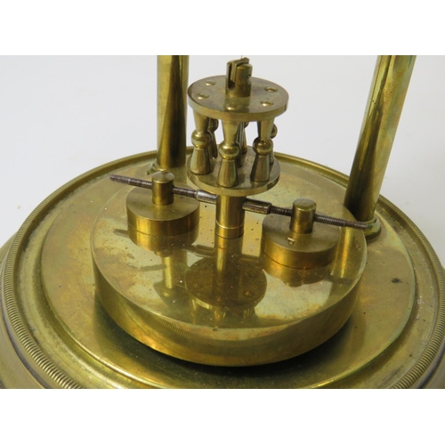 47 - German made brass Anniversary clock under Glass dome. Appears to be in running order.  Small piece m... 