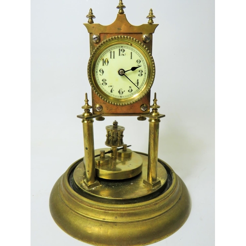 48 - Brass made Annivesary clock under Glass dome.  Enamel face, running order. No key available.   Appro... 