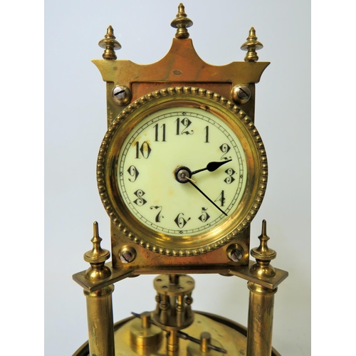 48 - Brass made Annivesary clock under Glass dome.  Enamel face, running order. No key available.   Appro... 