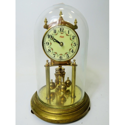 49 - West German Made Kundo Brass based Anniversary Clock. Running order. Adustable height feet. Comes wi... 