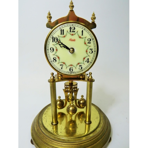 49 - West German Made Kundo Brass based Anniversary Clock. Running order. Adustable height feet. Comes wi... 