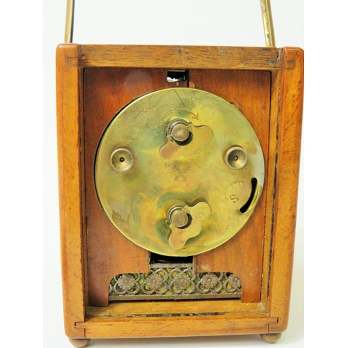 53 - Small German made Carriage Alarm clock in running order. 4 inches tall.   Requires key. See photos.