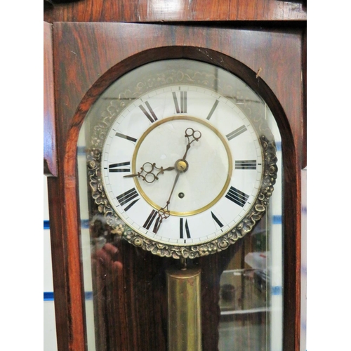 74 - Mahogany cased wall clock with enamel dial. Single weight drive. Running order with key.  Approx 42 ... 