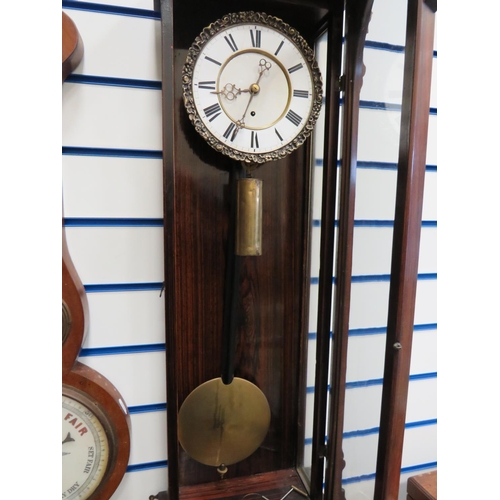 74 - Mahogany cased wall clock with enamel dial. Single weight drive. Running order with key.  Approx 42 ... 