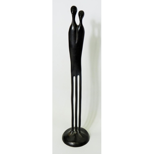 78 - Stylised Metal Sculpture of a Tribal Man and Woman approx 17 inches tall.  See photos.