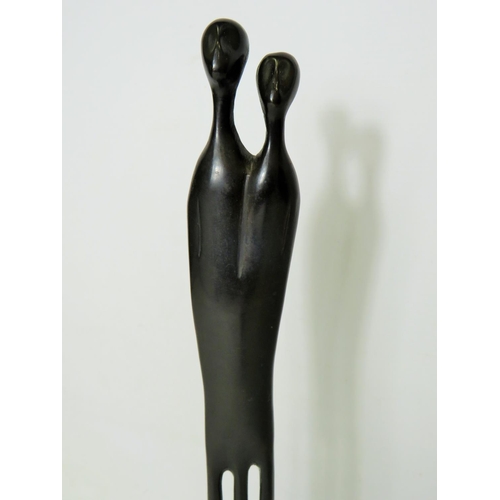 78 - Stylised Metal Sculpture of a Tribal Man and Woman approx 17 inches tall.  See photos.