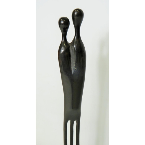 78 - Stylised Metal Sculpture of a Tribal Man and Woman approx 17 inches tall.  See photos.