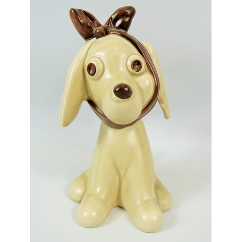 97 - Sylvac Toothache Dog number 2455 in excellent condition. Measures approx 8.5 inches tall.