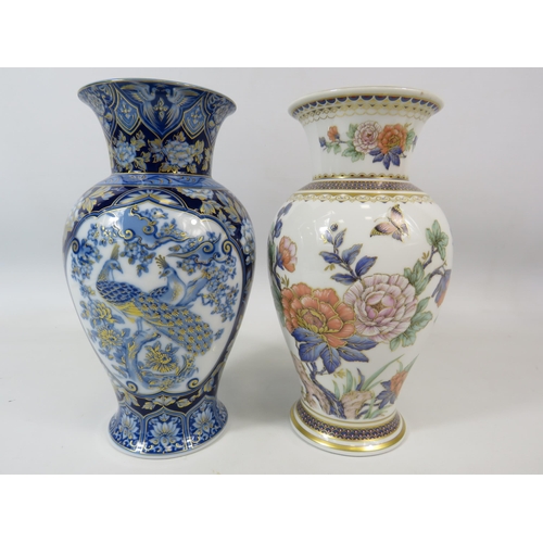 102 - 2 Kaiser German Porcelain vases 22cm tall in the Duchesse and Etude patterns.