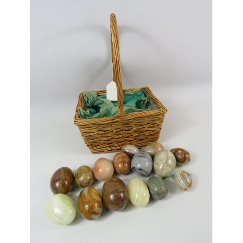 309 - Basket with 15 polished stone and onyx eggs.