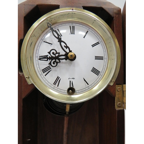 190 - Minature mechanical 30 day Regulator which measures 18 inches long. Running order in excellent condi... 